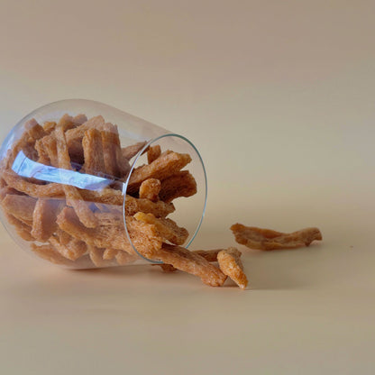 Close-up of Nibble Network Wasabi Soy Crunches packet with crunchy soy sticks, plant-based halal-certified snack high in fibre and iron