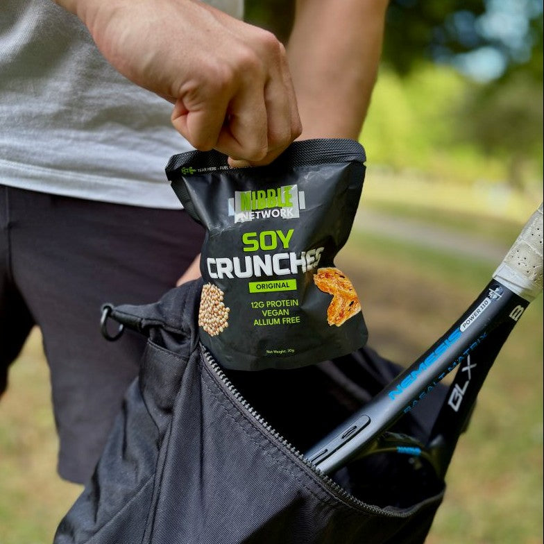 A bag of original Soy Crunches being taken out of a gym bag as a healthy post-workout snack