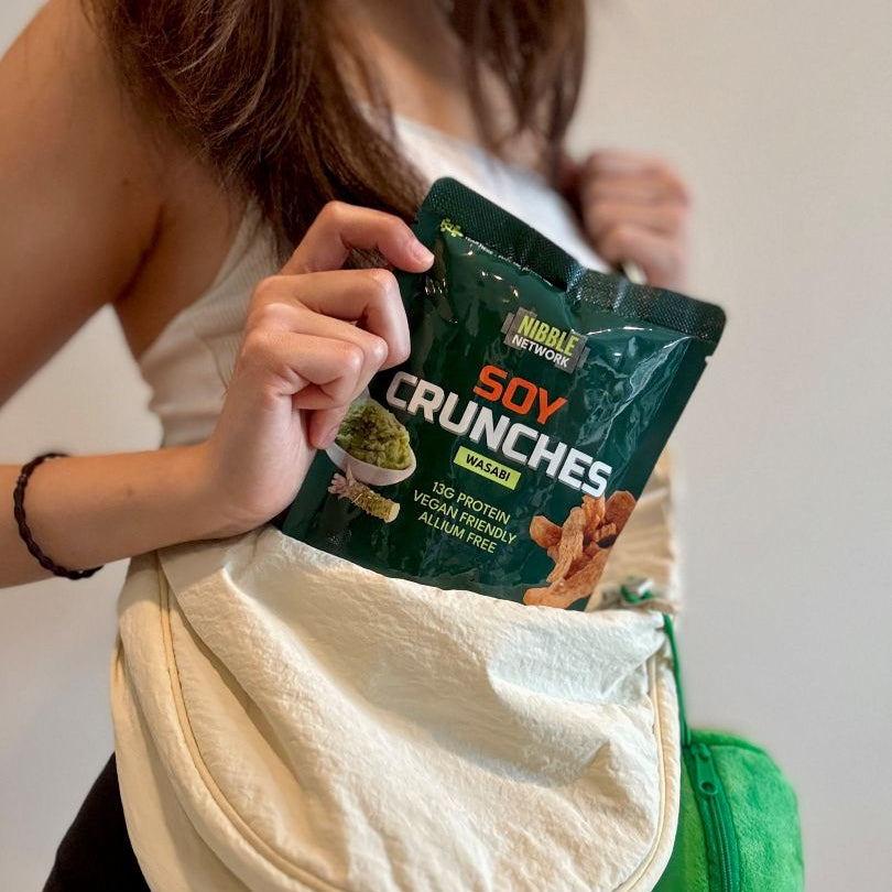 Gwen grabbing a pack of Soy Crunches Wasabi as an on-the-go refreshment