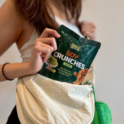 Gwen grabbing a pack of Soy Crunches Wasabi as an on-the-go refreshment