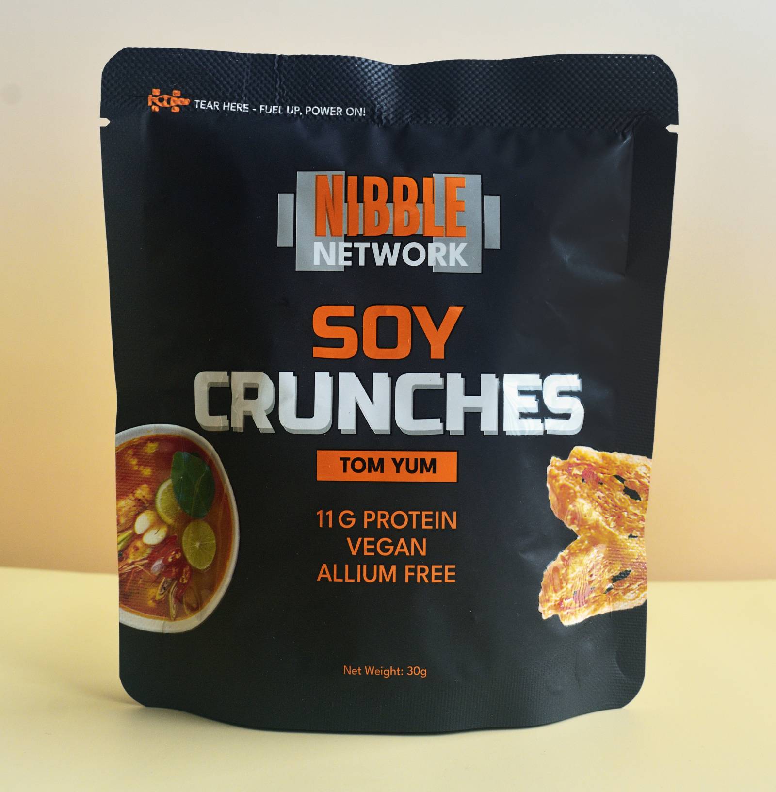 Nibble Network Soy Crunches Tom Yum flavour packet, spicy Thai-inspired vegan high-protein soy snack with 10g+ plant protein